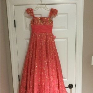 Coral sequined Sherri Hill pageant gown